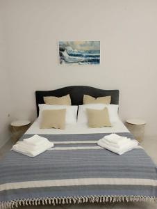 מיטה או מיטות בחדר ב-Casa di Luna, incantevole bilo con idromassaggio