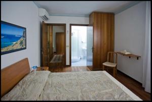 Postel nebo postele na pokoji v ubytování B&B Oasi di Venezia