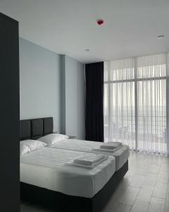 Postel nebo postele na pokoji v ubytování Hotel Biota