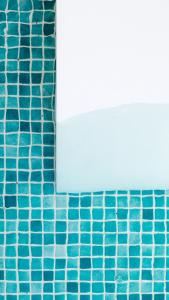 a blue tiled floor in a swimming pool at Chloe hotel Alacati in Alacati +133 photos