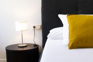 Posteľ alebo postele v izbe v ubytovaní Haizea by Smiling Rentals