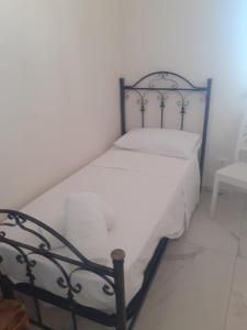 Posteľ alebo postele v izbe v ubytovaní casa vacanza crystal