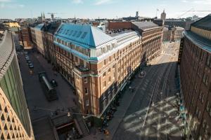 an overhead view of a city street with buildings at Bob W Kluuvi in Helsinki