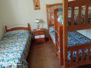 Postel nebo postele na pokoji v ubytování Vivienda turística volveré