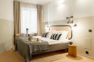 Letto o letti in una camera di Bob W Kluuvi