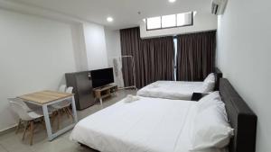 Katil atau katil-katil dalam bilik di Pacific Towers Star Seksyen 13 PJ Jaya One Parking Netflix Pool Kitchen