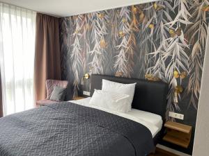 Katil atau katil-katil dalam bilik di Hotel Hofmeisterhaus - Self Check-in