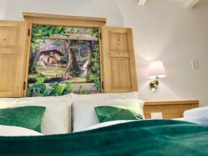 Posteľ alebo postele v izbe v ubytovaní La Finestra sul Giardino - B&B