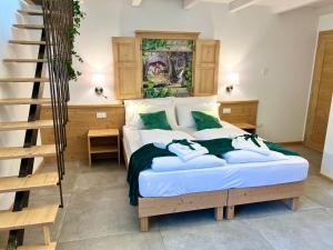 Posteľ alebo postele v izbe v ubytovaní La Finestra sul Giardino - B&B
