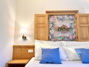 Posteľ alebo postele v izbe v ubytovaní La Finestra sul Giardino - B&B