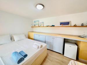 Postel nebo postele na pokoji v ubytování Tzavelitiko Home