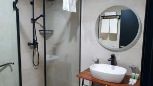 Ένα μπάνιο στο CAROUSEL HOTEL