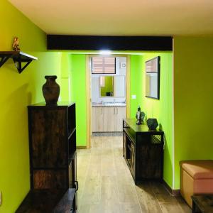 A kitchen or kitchenette at Agradable casa con patio a 100 metros de la playa