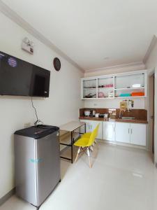 Кухня или мини-кухня в 29 Palm's Panglao Suites
