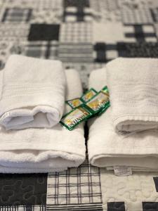 a pile of towels sitting on top of a table at Valentino in Termas de Río Hondo