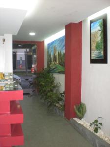 Uma TV ou centro de entretenimento em Hotel Dom Joao IV