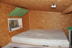 Postel nebo postele na pokoji v ubytování chata-cabina