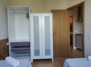 Posteľ alebo postele v izbe v ubytovaní Diagonal Apartments