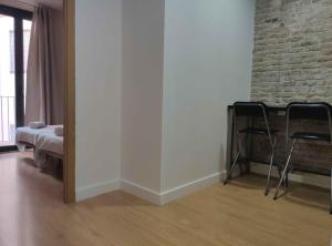 Posteľ alebo postele v izbe v ubytovaní Diagonal Apartments