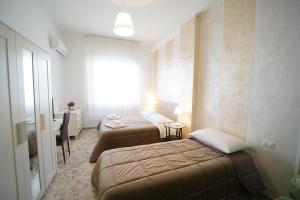 B&B Nonna Fifina客房内的一张或多张床位