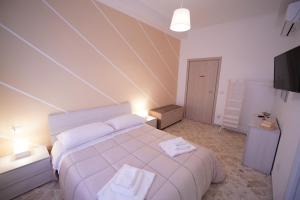 B&B Nonna Fifina客房内的一张或多张床位