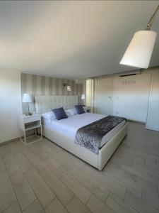 Postel nebo postele na pokoji v ubytování Resort la Magnolia