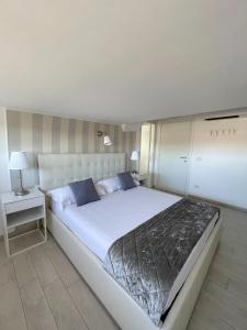 Postel nebo postele na pokoji v ubytování Resort la Magnolia