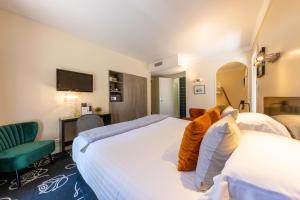 Postel nebo postele na pokoji v ubytování Le Madeloc Hôtel & Spa + 37 fotografií