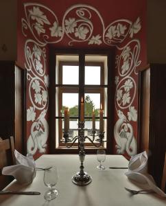 A seating area at Hotel Grand Vígľaš