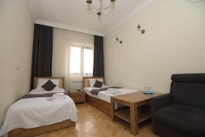 Voodi või voodid majutusasutuse V.MOD Hotel toas