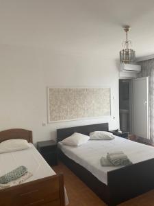 Letto o letti in una camera di Badu Guest House