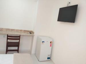 TV a/nebo společenská místnost v ubytování Hotel Pousada Hamburgo