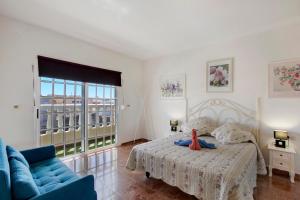 Postel nebo postele na pokoji v ubytování Casa del Pescador planta alta