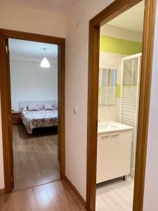 Postel nebo postele na pokoji v ubytování Habitación con baño privado- En casa familiar Beatriz