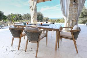 Balkón nebo terasa v ubytování Island Villa Adriana with heated pool and sauna