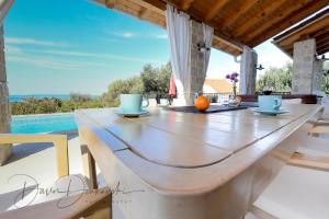 Balkón nebo terasa v ubytování Island Villa Adriana with heated pool and sauna
