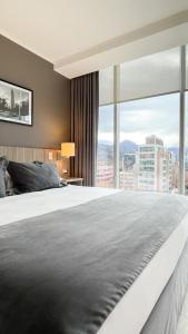 Кровать или кровати в номере Hotel Capital Bellet