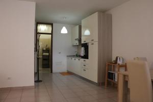 A kitchen or kitchenette at Le Androne di Trento