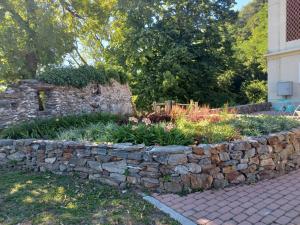 A garden outside Open Cascina