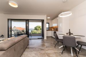 Khu vực ghế ngồi tại Deluxe Apartment Cigit