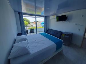 Postelja oz. postelje v sobi nastanitve Sky view hotel tolu