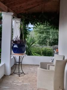 Posedenie v ubytovaní Cozy Corfu Bungalow 5 minutes to Aqualand