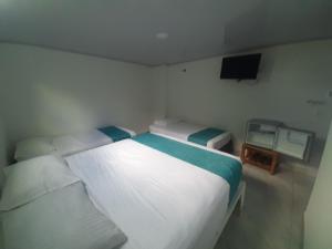 Postelja oz. postelje v sobi nastanitve Sky view hotel tolu