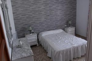 Postel nebo postele na pokoji v ubytování Casa La Maceta + 26 fotografií