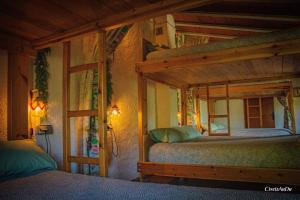 Säng eller sängar i ett rum på Refugi de Muntanya Els Masets