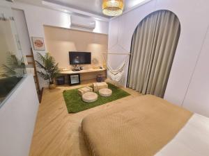 TV o dispositivi per l'intrattenimento presso 輕森嶼