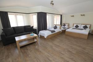 Voodi või voodid majutusasutuse V.MOD Hotel toas