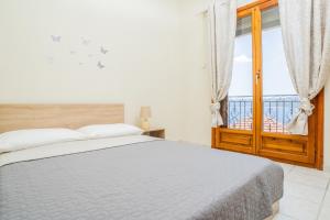 Krevet ili kreveti u jedinici u okviru objekta Sea&Sun Pyrgadikia Apartments