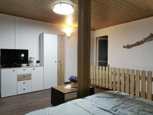 Posteľ alebo postele v izbe v ubytovaní Vonyarc House
