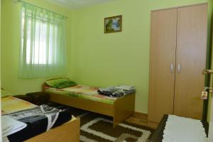 Postel nebo postele na pokoji v ubytování Kuca za odmor Dragina